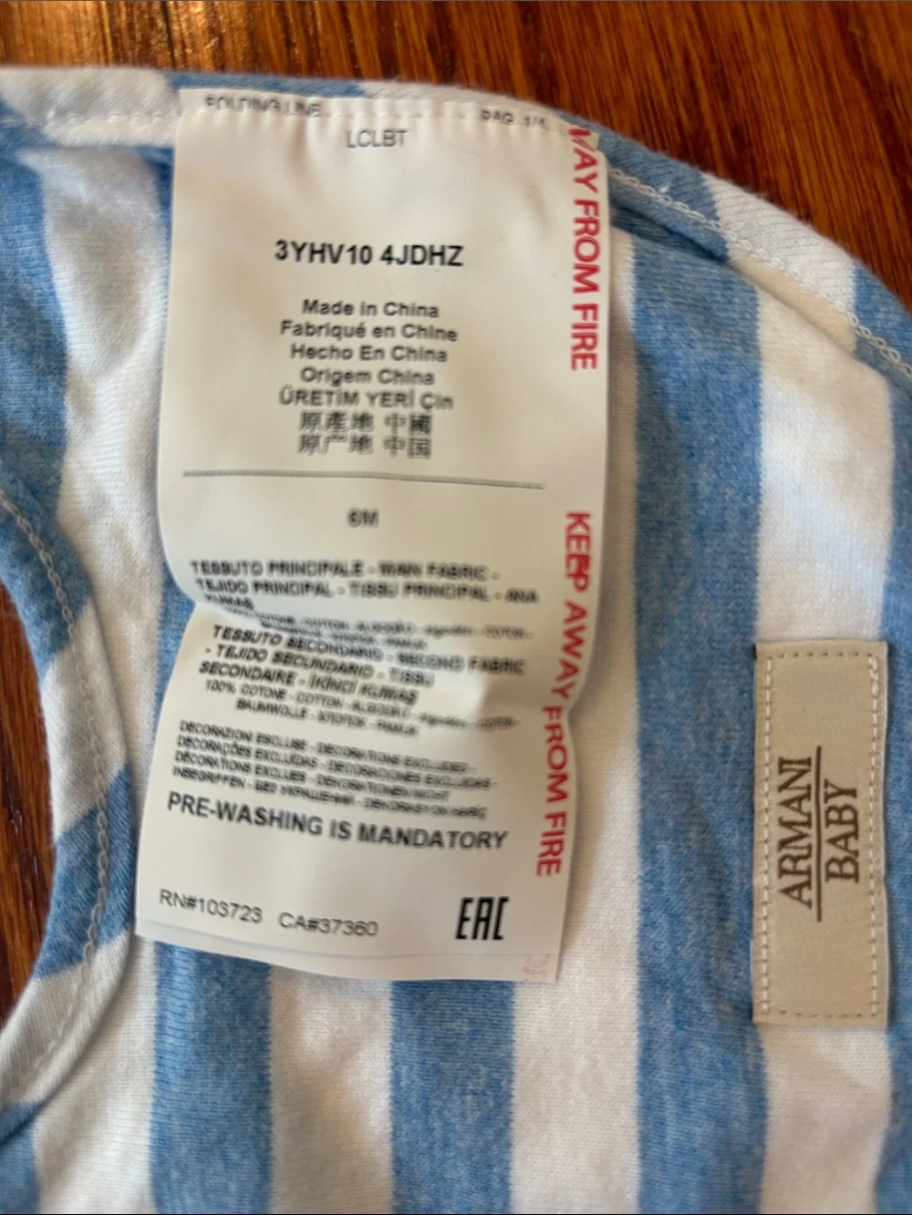 Giorgio Armani Baby White Bib with Blue Trim and Logo